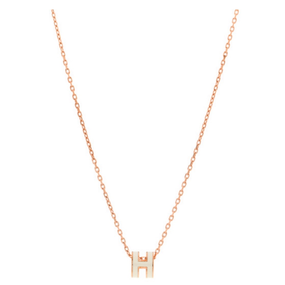 Selling this Authentic Hermes Pop h pendant in white.